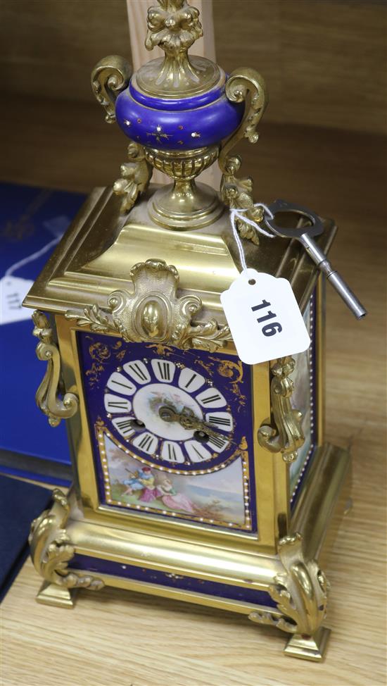 A 19th century French gilt brass and porcelain mounted mantel clock
